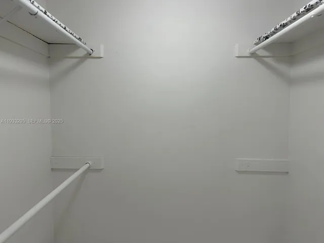 a front view of a building with garden