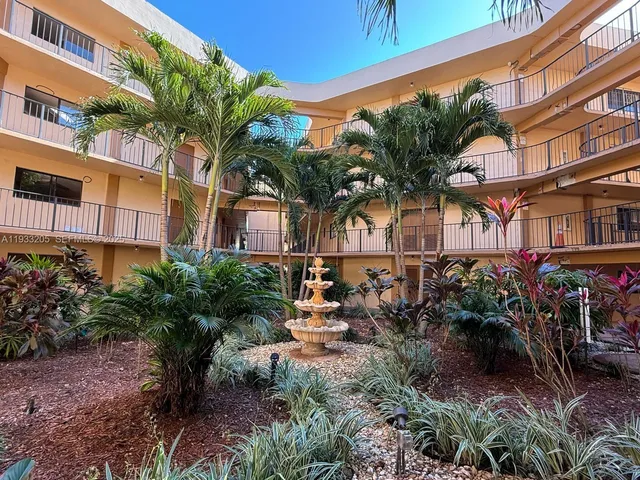 a view of a large building with a window