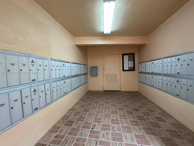 a view of a kitchen with appliances and cabinets
