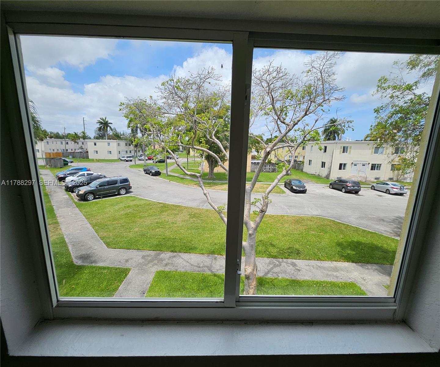 450 Northwest 84th Street, Unit 450 Miami, FL 33150 - Photo 28 of 28 a view of a window in a room