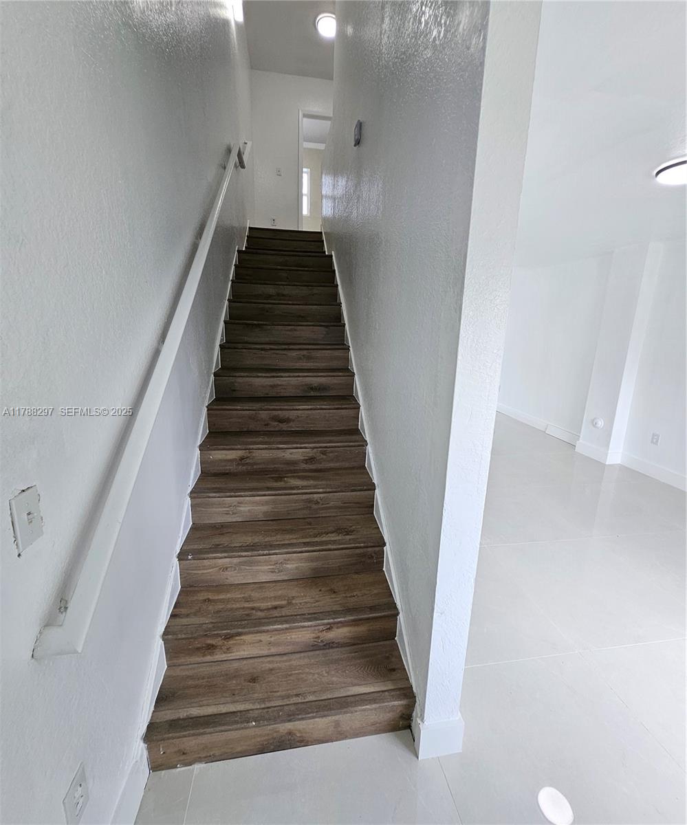 450 Northwest 84th Street, Unit 450 Miami, FL 33150 - Photo 8 of 28 a view of entryway