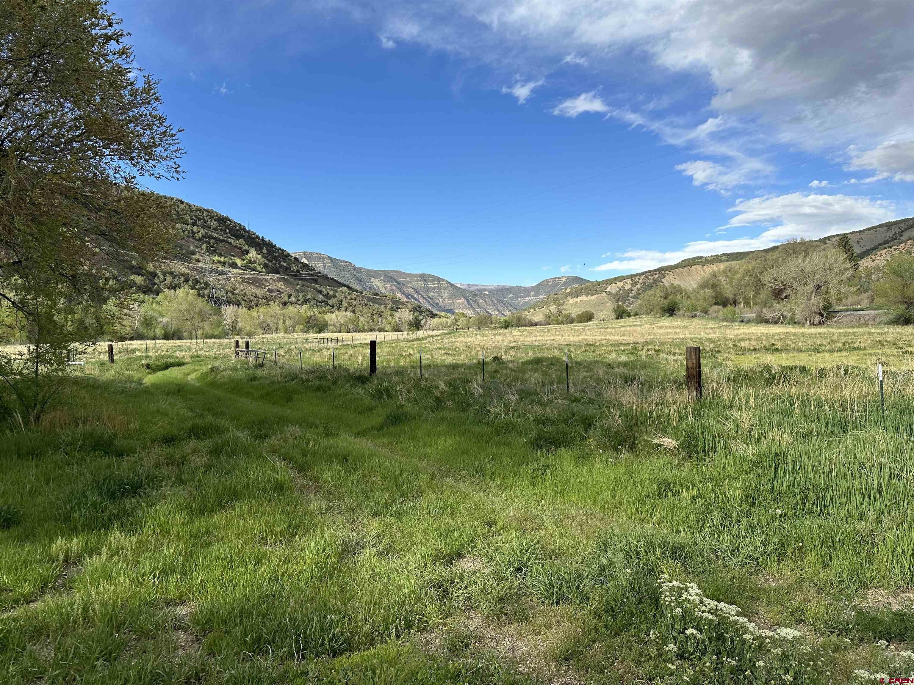 16459 Grange Road Paonia, CO 81428 - Photo 27 of 31 a view of an mountain with a yard