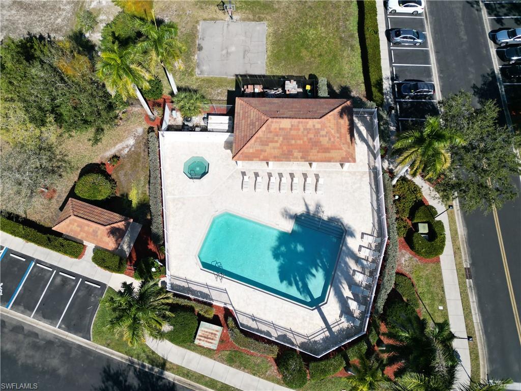 1180 Oxford Lane Naples, FL 34105 - Photo 34 of 35 Community Pool & Basketball Court