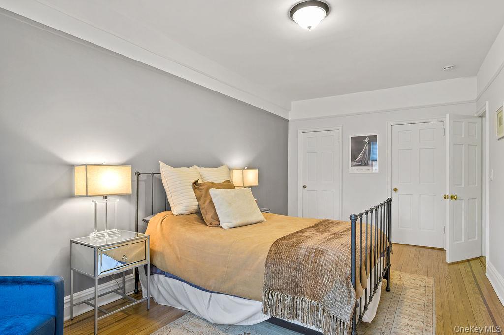43 Calton Road, Unit 5C New Rochelle, NY 10804 - Photo 19 of 32 Bedroom featuring wood-type flooring and a closet