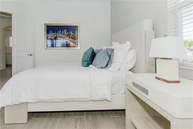 a bathroom with a sink toilet a mirror and shower