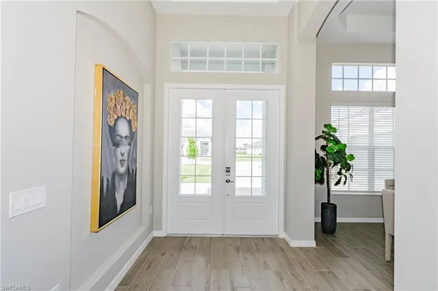 a view of livingroom with hardwood floor and hallway