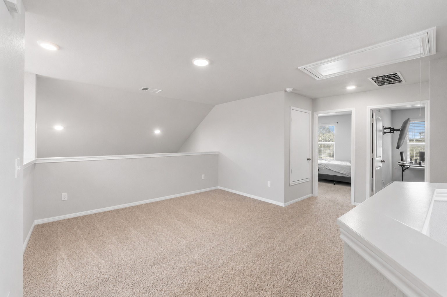 142 Brunnen Way Georgetown, TX 78626 - Photo 17 of 22 A versatile open loft area provides additional flexible living space.