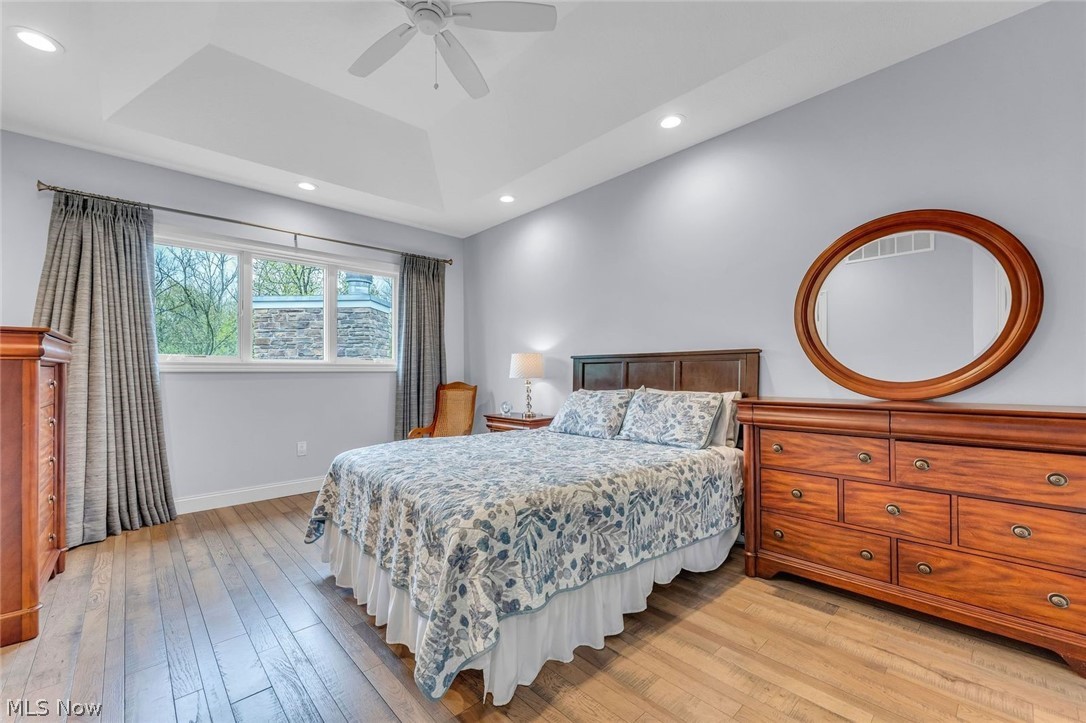 41264 Ravines Edge Way Lagrange, OH 44050 - Photo 28 of 43 Second floor Bedroom with tray ceilings and hardwood floors.