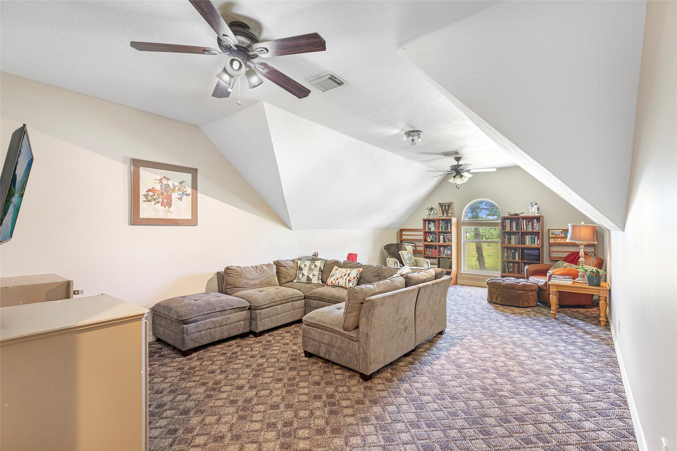 6530 Treaschwig Road, Unit 1 Spring, TX 77373 - Photo 23 of 32 a living room with furniture and a window