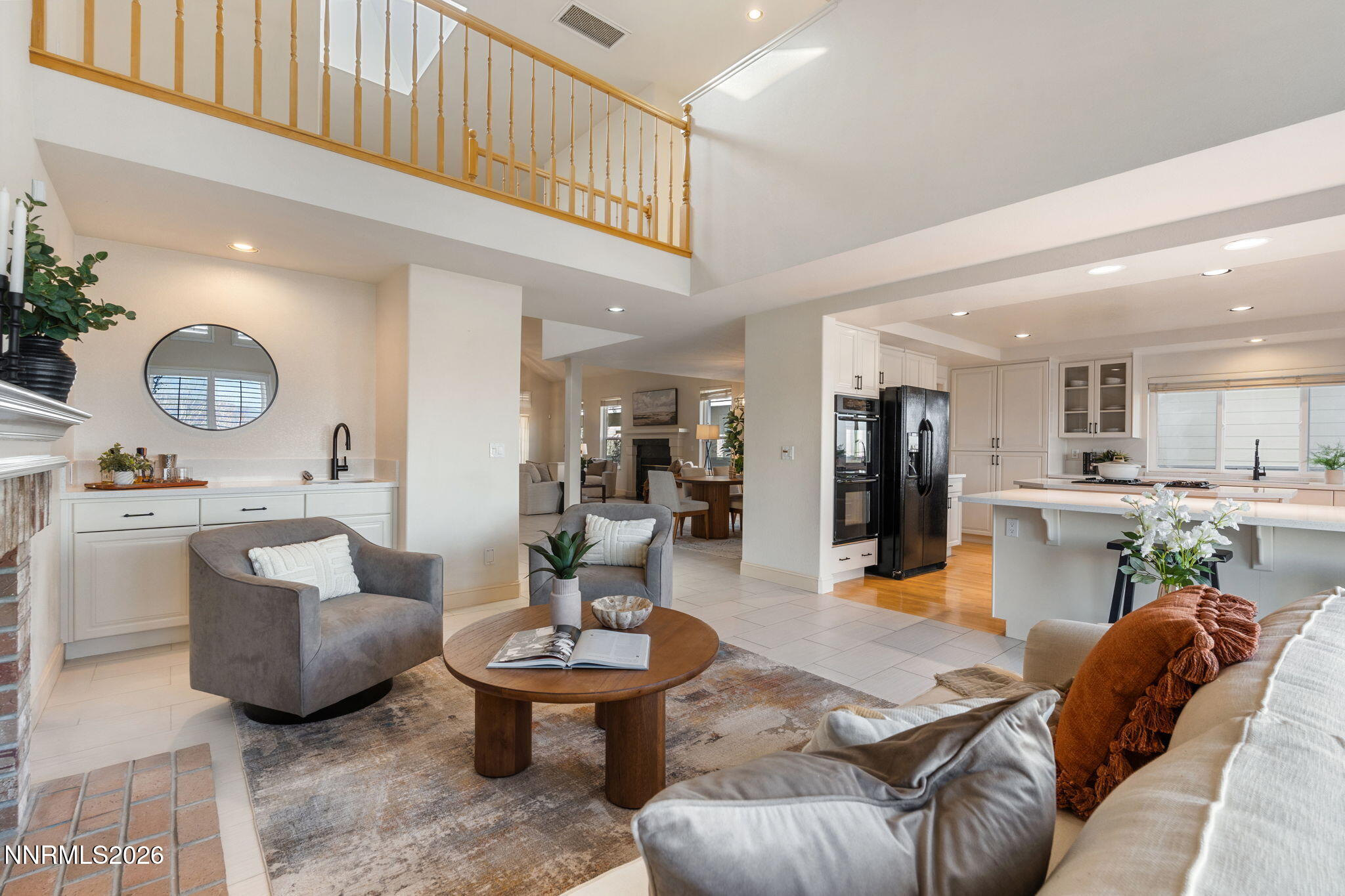 6186 Squires Lane Reno, NV 89519 - Photo 20 of 57 a living room with furniture and kitchen view