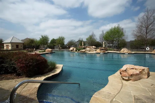 a view of a lake from a balcony