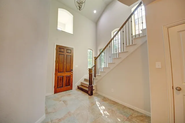 a view of an entryway with staircase