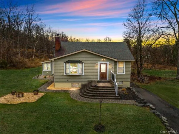 a house view with a garden space