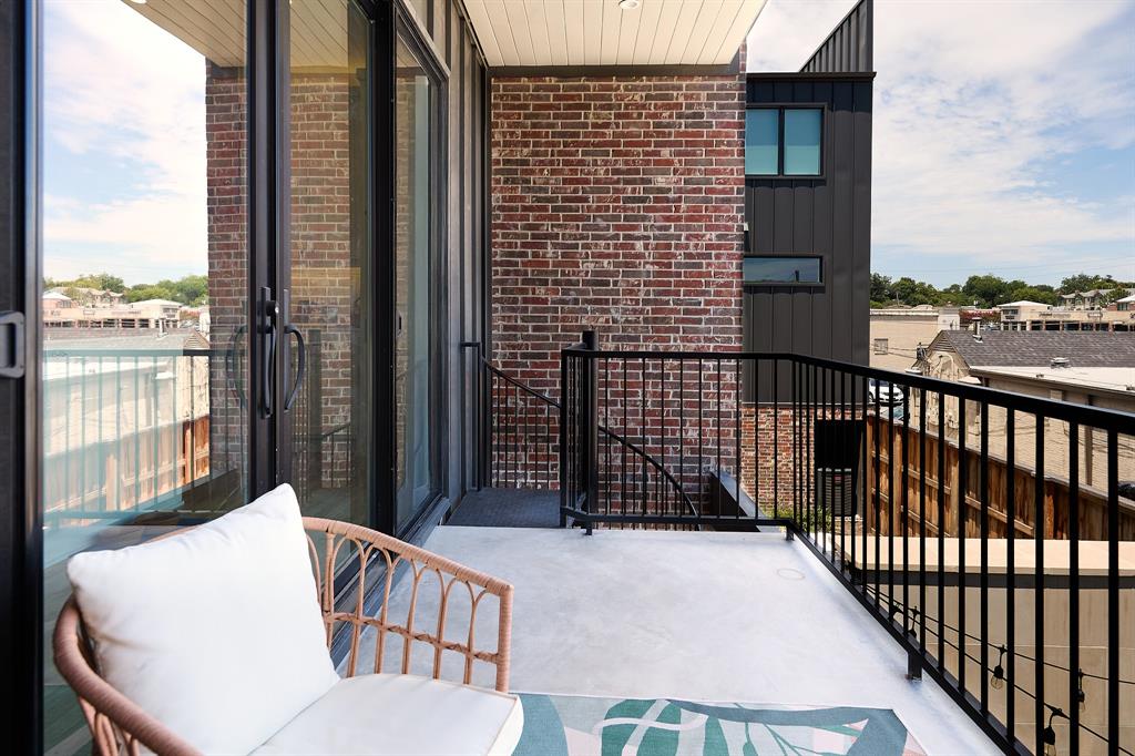 1844 Mecca Street Dallas, TX 75206 - Photo 14 of 33 Spiral staircase connects the lower patio for simple and quick second floor and kitchen access
