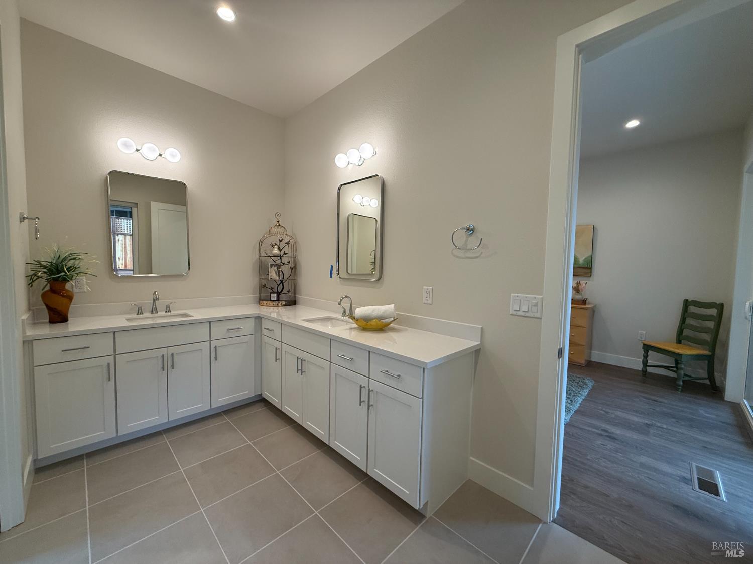1901 Carlile Place Santa Rosa, CA 95403 - Photo 14 of 29 a spacious bathroom with a granite countertop sink a mirror and a