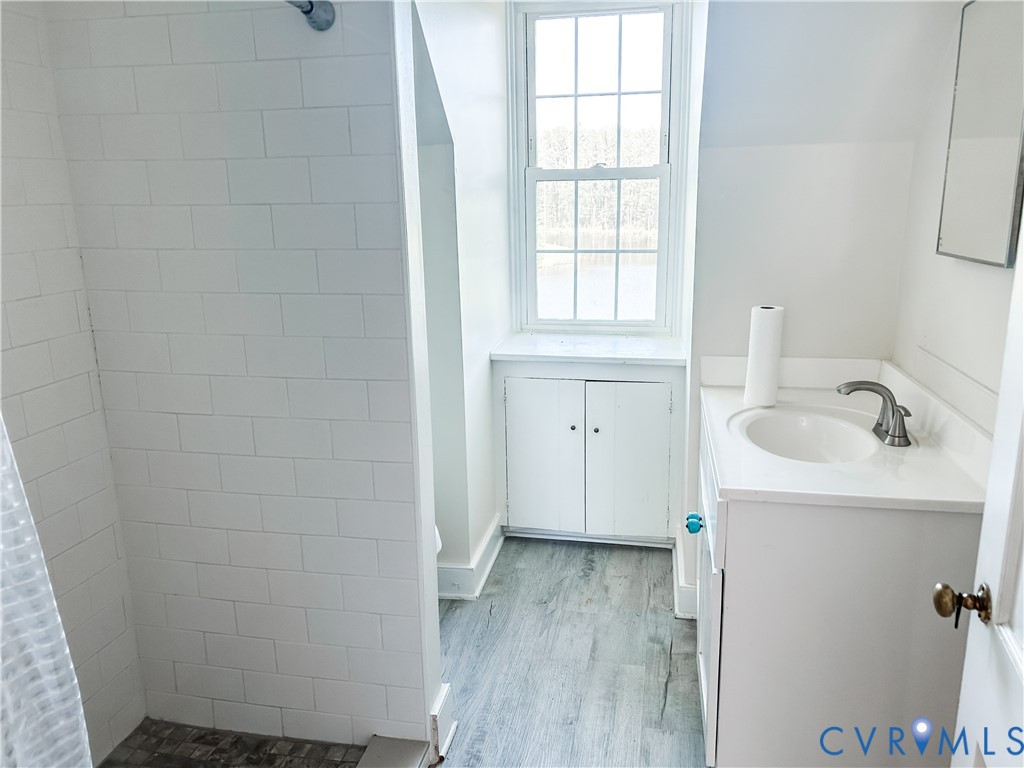 1346 Hockett Road Manakin-Sabot, VA 23103 - Photo 22 of 25 Full bathroom featuring wood finished floors, vani