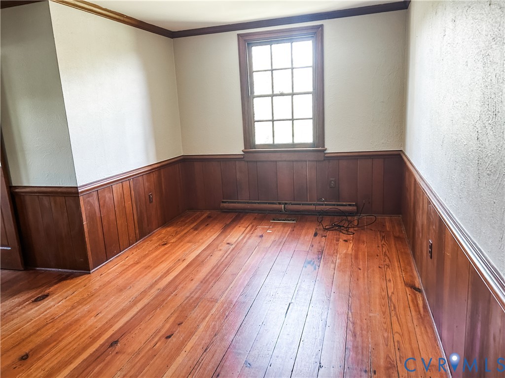 1346 Hockett Road Manakin-Sabot, VA 23103 - Photo 6 of 25 Spare room with wood-type flooring, wooden walls,