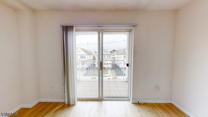 534 Maple Avenue Elizabeth, NJ 07202 - Photo 26 of 48 a view of walk in closet with wooden floor