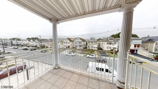 a view of a balcony with city view