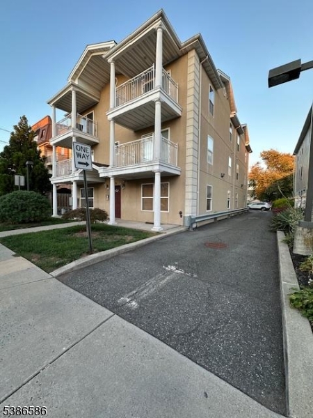 534 Maple Avenue Elizabeth, NJ 07202 - Photo 4 of 48 a front view of a house with a yard