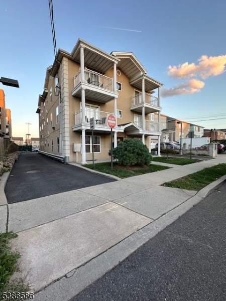 534 Maple Avenue Elizabeth, NJ 07202 - Photo 46 of 48 a view of a building with a yard