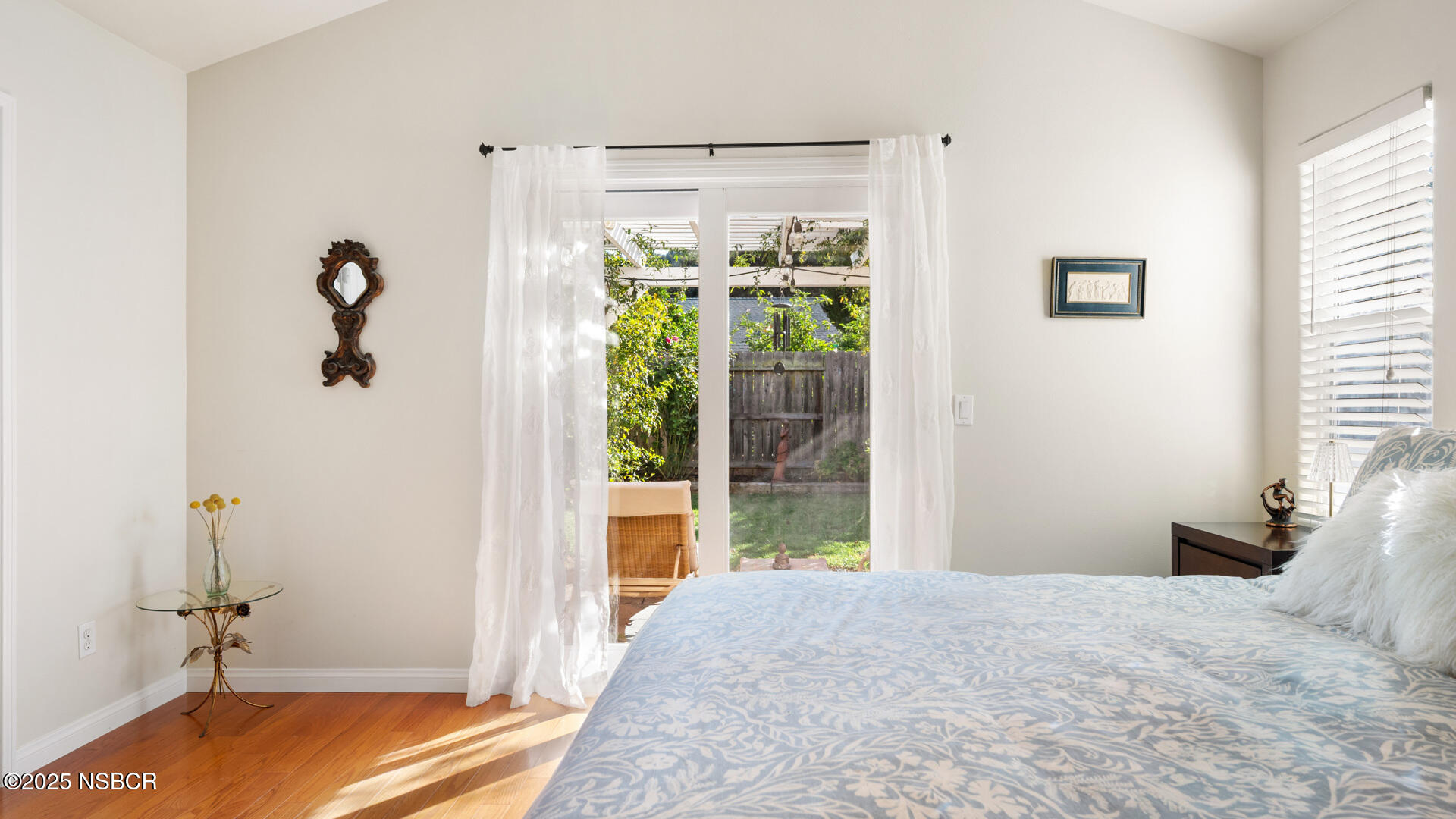 738 Hill Street Los Alamos, CA 93440 - Photo 11 of 27 a bedroom with a bed and a window