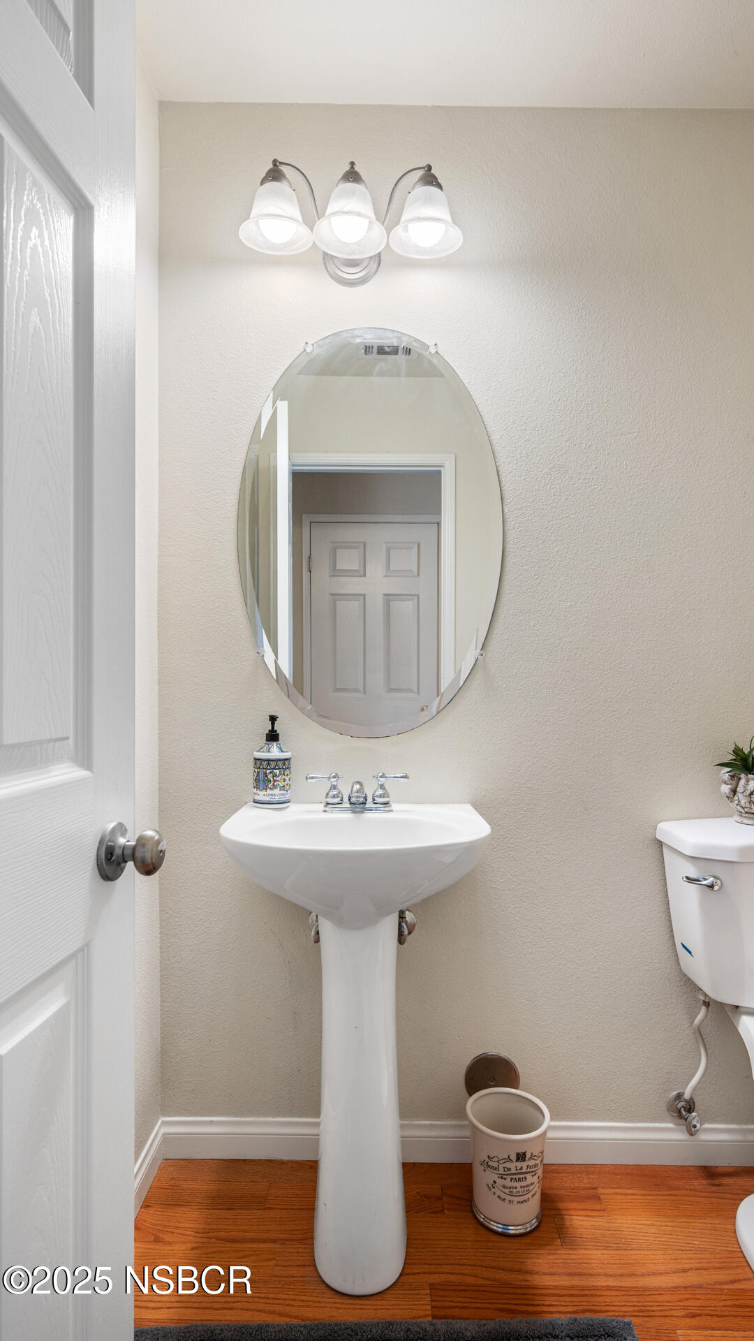 738 Hill Street Los Alamos, CA 93440 - Photo 13 of 27 a bathroom with a sink and a mirror