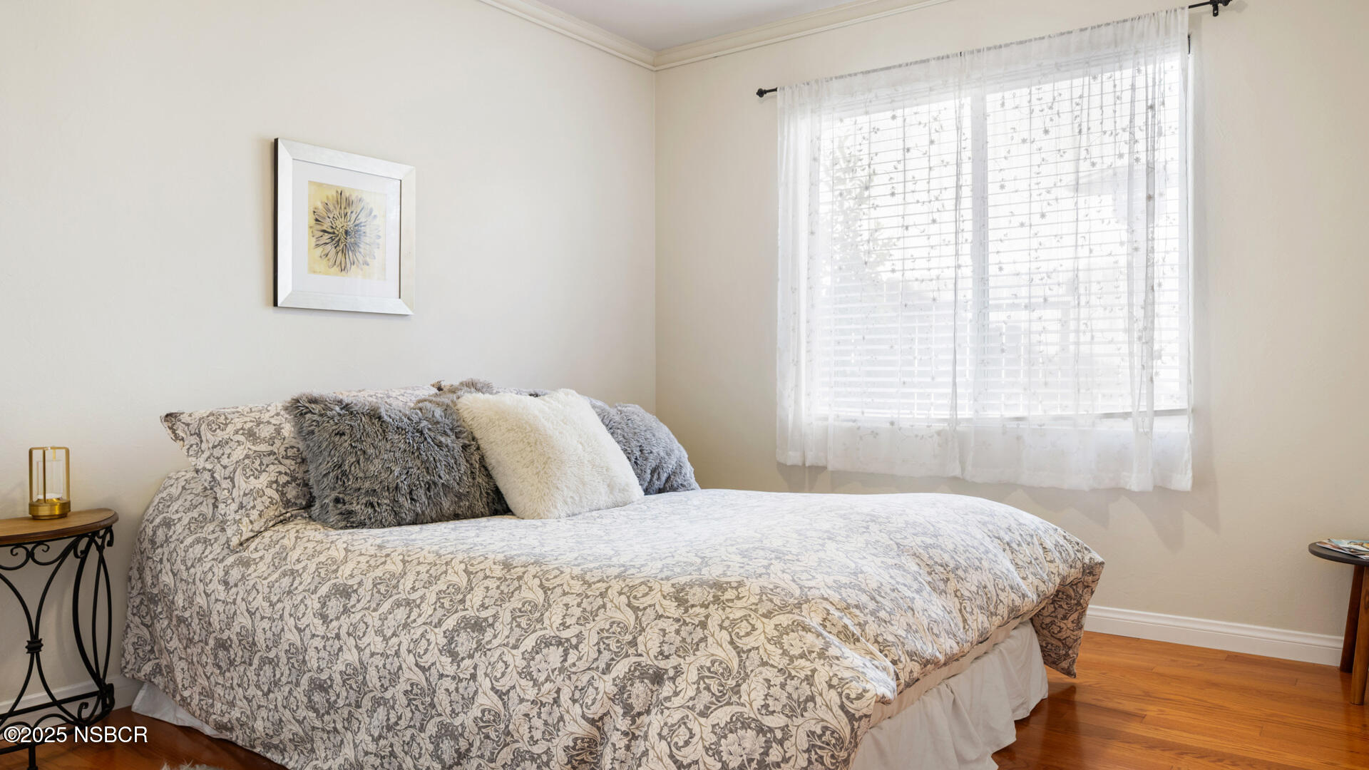 738 Hill Street Los Alamos, CA 93440 - Photo 14 of 27 a bedroom with a bed and a window