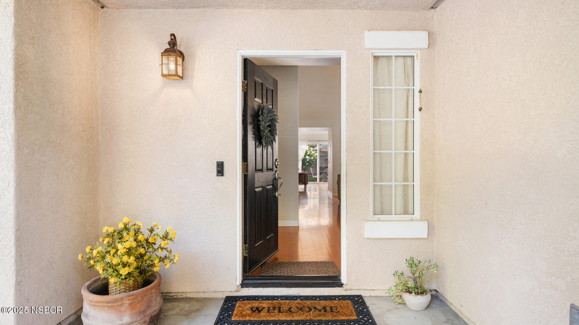 738 Hill Street Los Alamos, CA 93440 - Photo 4 of 27 a view of bathroom with a potted plant on the wall and a window