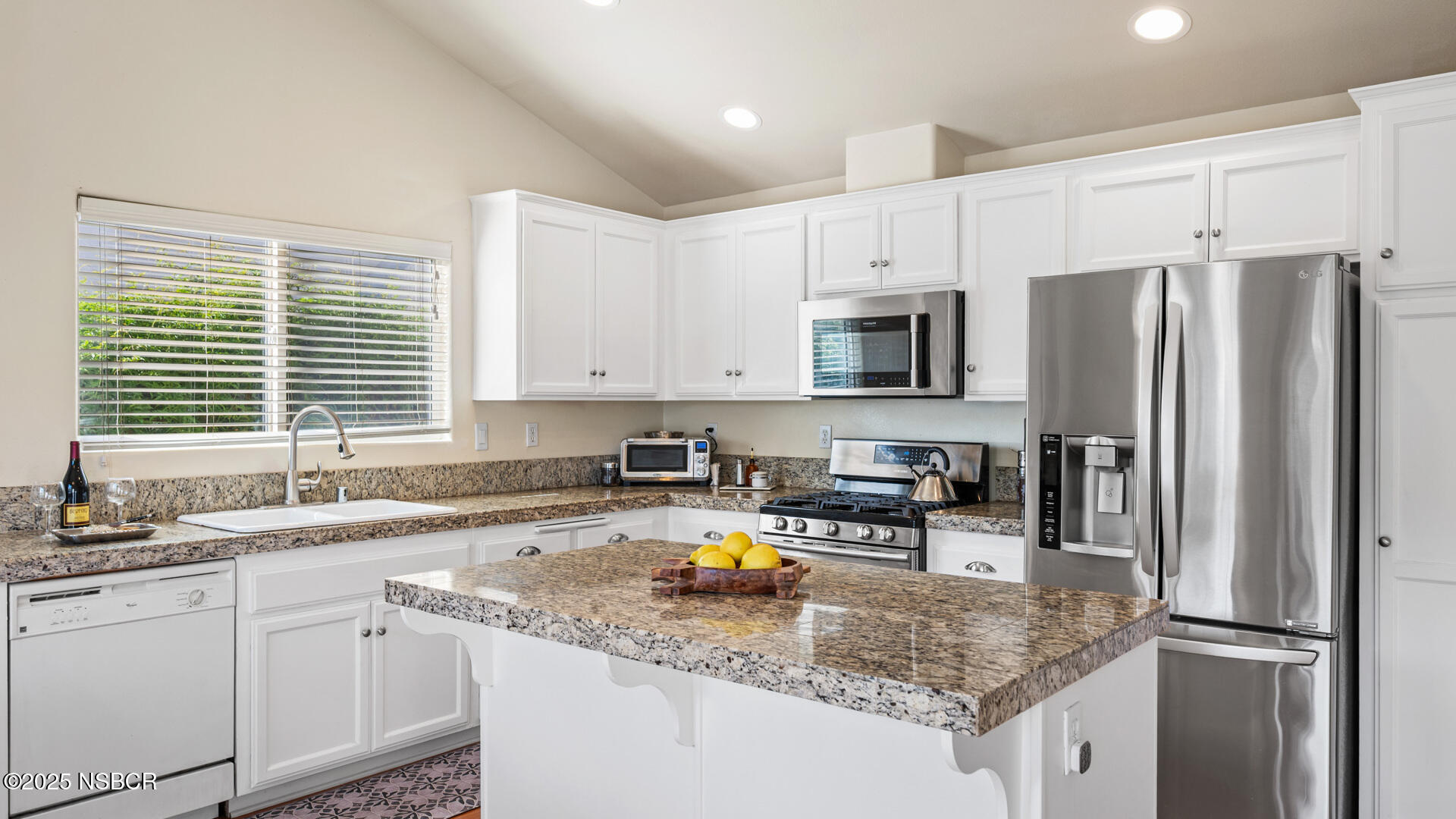 738 Hill Street Los Alamos, CA 93440 - Photo 8 of 27 a kitchen with stainless steel appliances granite countertop a refrigerator a sink a stove a microwave and island