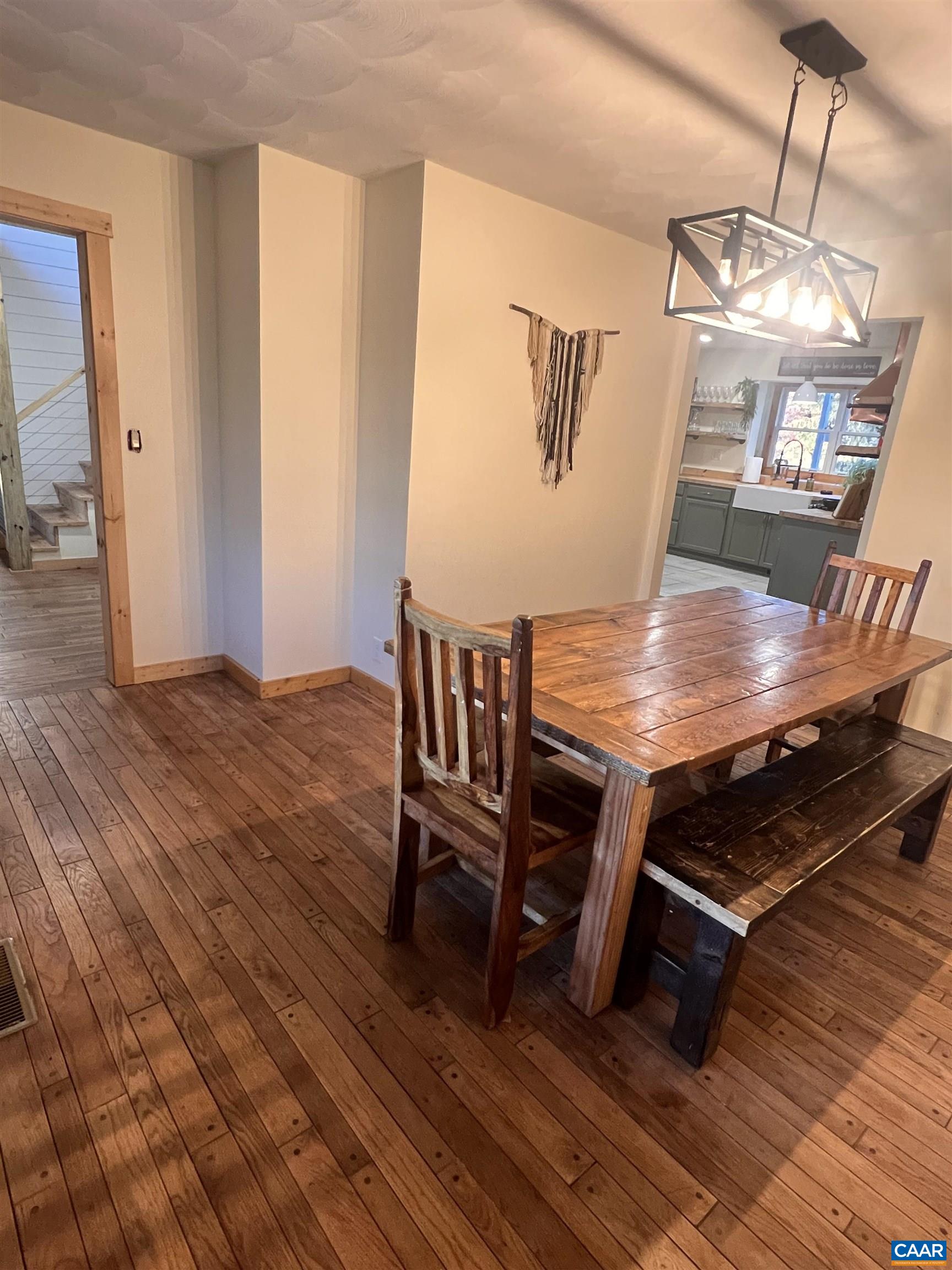 8876 East Timber Ridge Road Mount Crawford, VA 22841 - Photo 28 of 75 a view of a dining room with furniture and wooden floor
