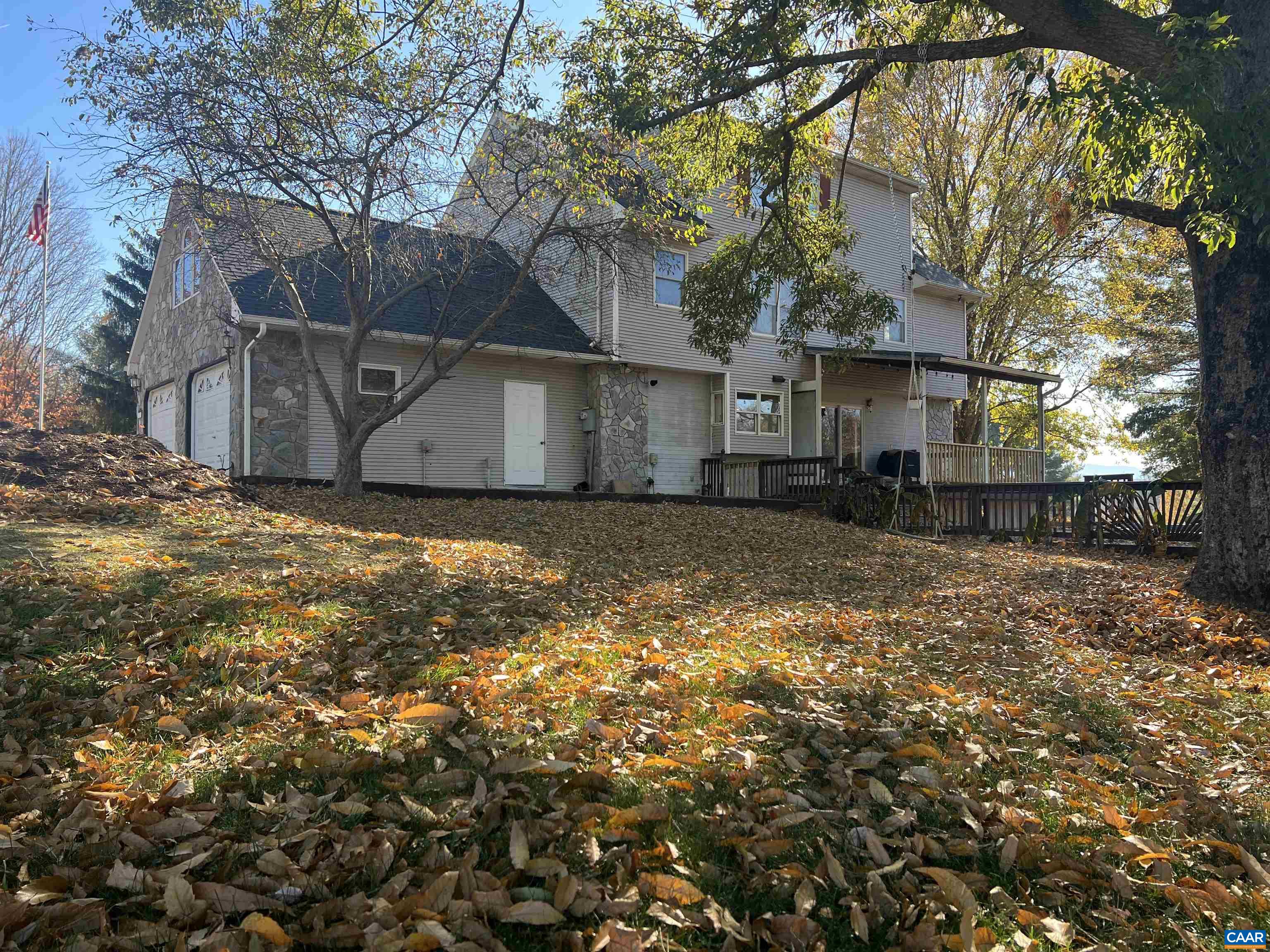8876 East Timber Ridge Road Mount Crawford, VA 22841 - Photo 6 of 75 a view of a garage with a tree