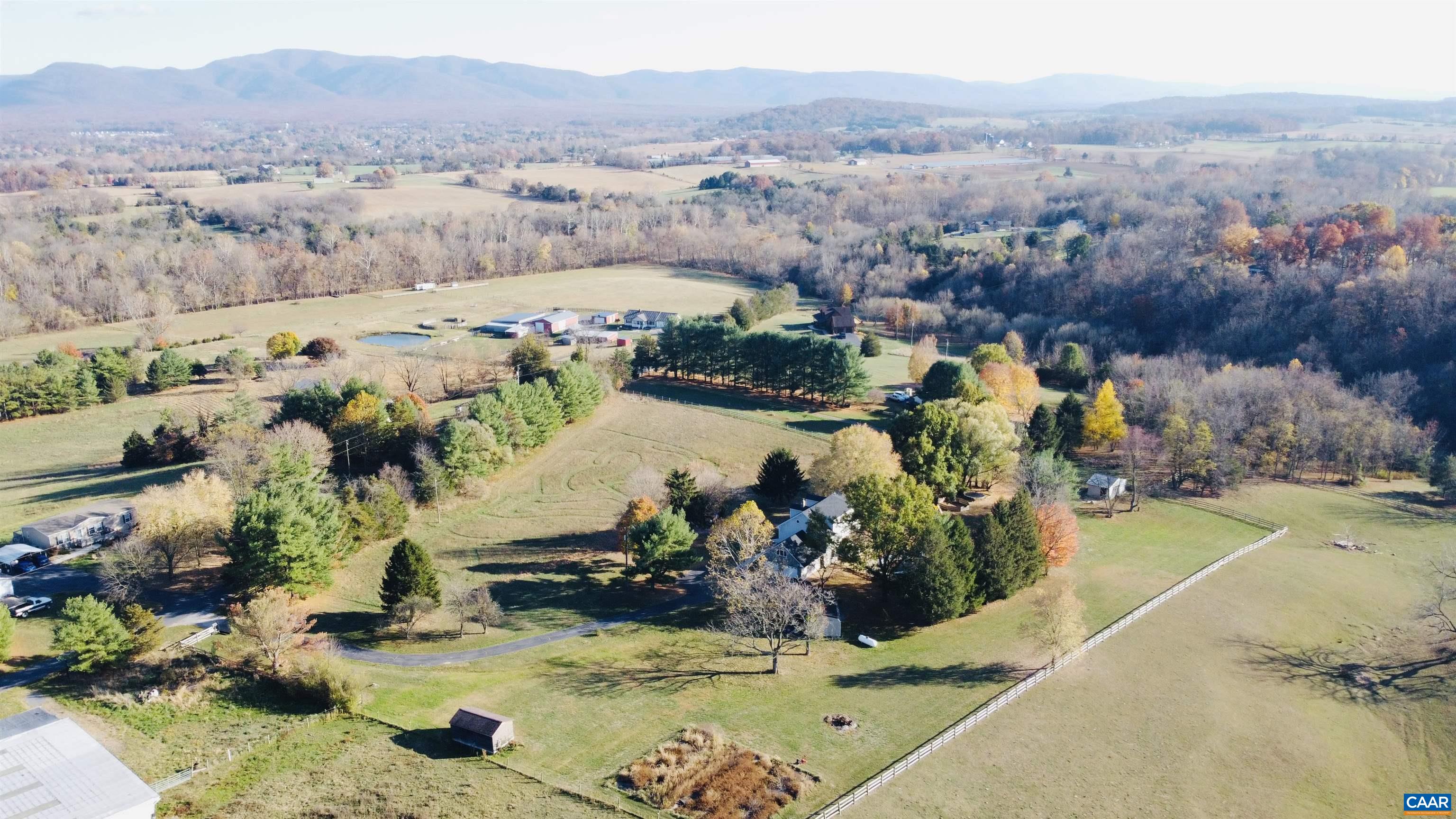8876 East Timber Ridge Road Mount Crawford, VA 22841 - Photo 72 of 75 an aerial view of a house with a swimming pool