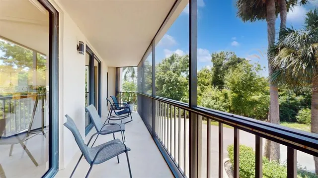 a view of balcony with furniture