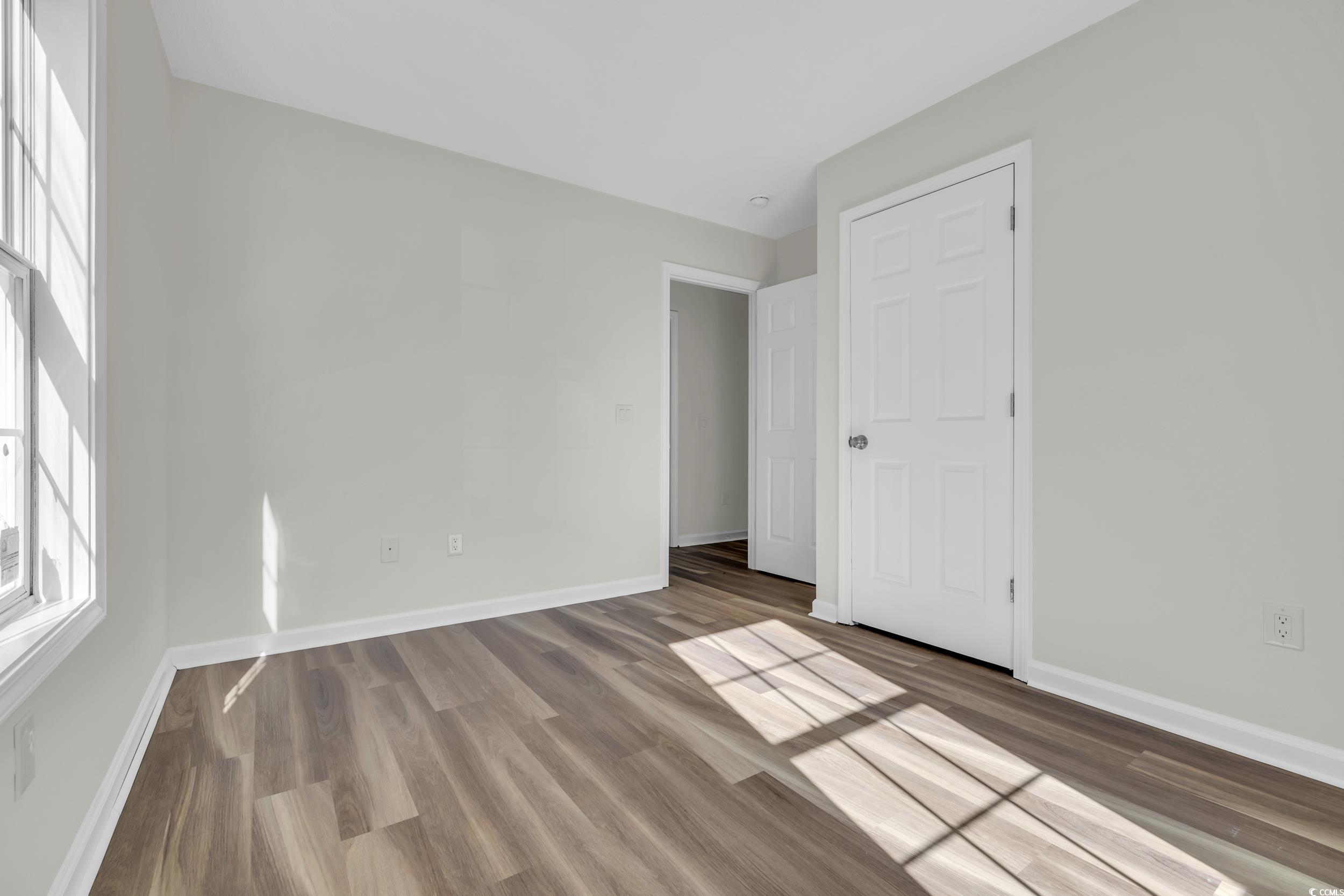 1960 Hampton Street Georgetown, SC 29440 - Photo 15 of 22 Unfurnished bedroom featuring hardwood / wood-styl