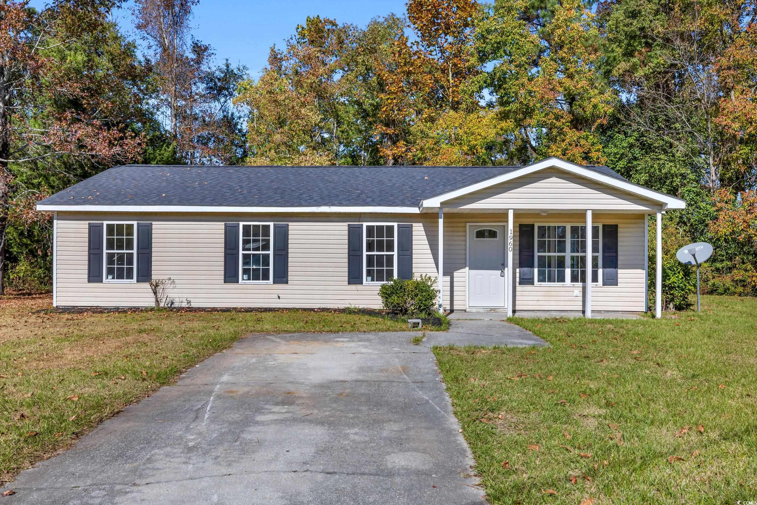 1960 Hampton Street Georgetown, SC 29440 - Photo 2 of 22 Ranch-style home with covered porch and a front ya