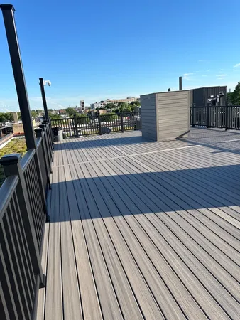 a view of deck with wooden floor and fence