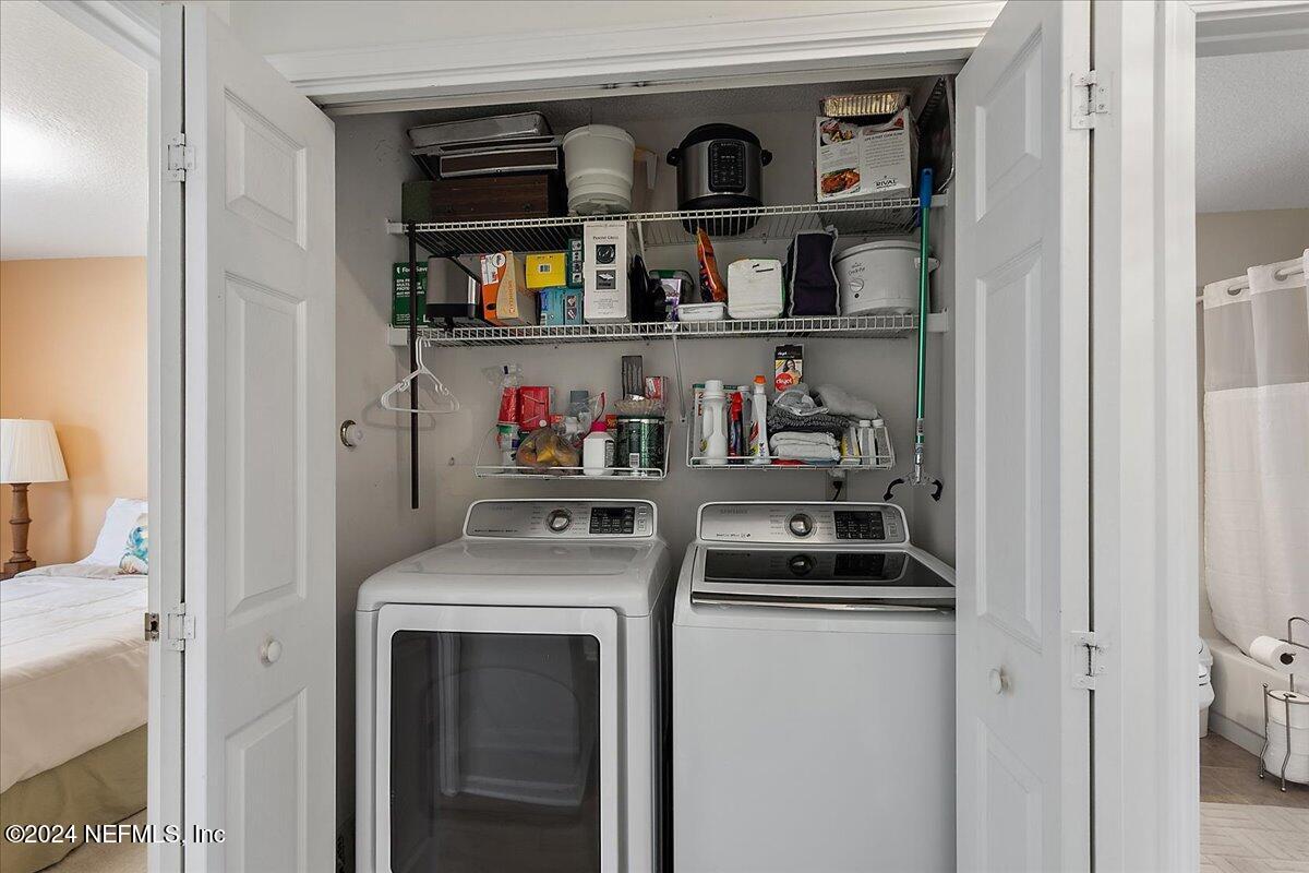 12417 Nesting Eagles Way Jacksonville, FL 32225 - Photo 17 of 23 a view of washer and dryer