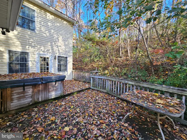 a view of a chairs setting on the deck