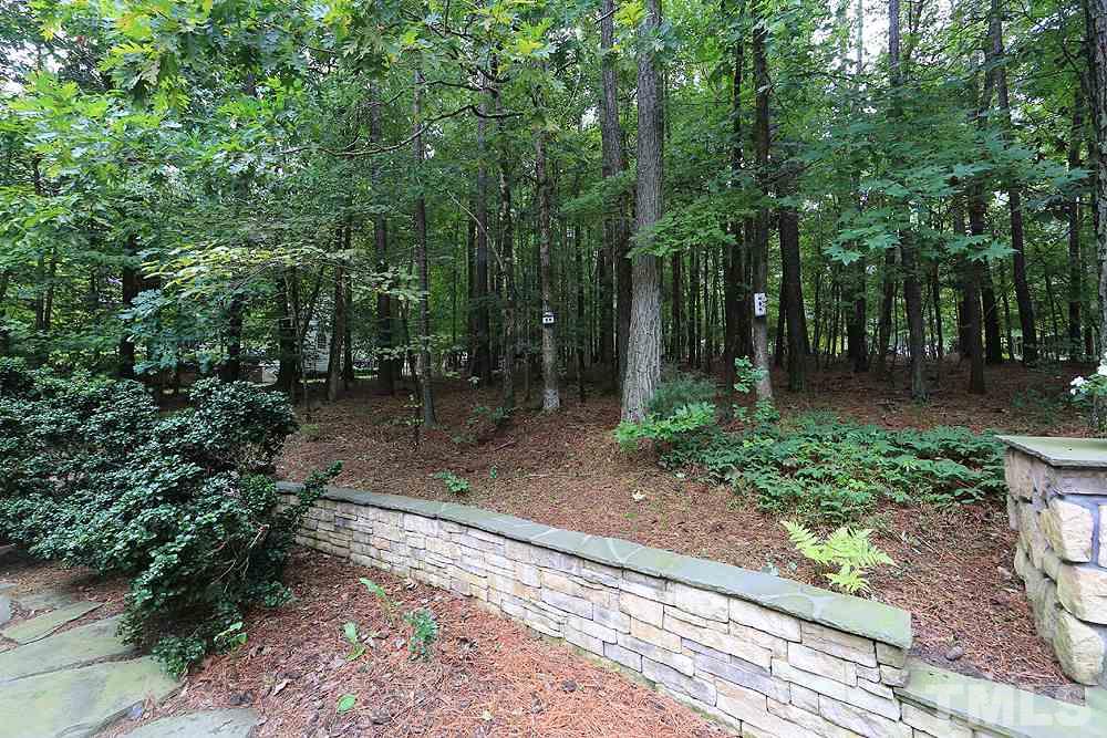 5921 Wild Orchid Trail Raleigh, NC 27613 - Photo 28 of 30 Pretty retaining wall