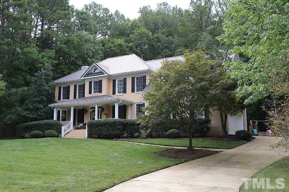 5921 Wild Orchid Trail Raleigh, NC 27613 - Photo 4 of 30 Beautiful landscaping frames the front. Home features a gas tankless water heater, newer HVACs and low HOA dues.