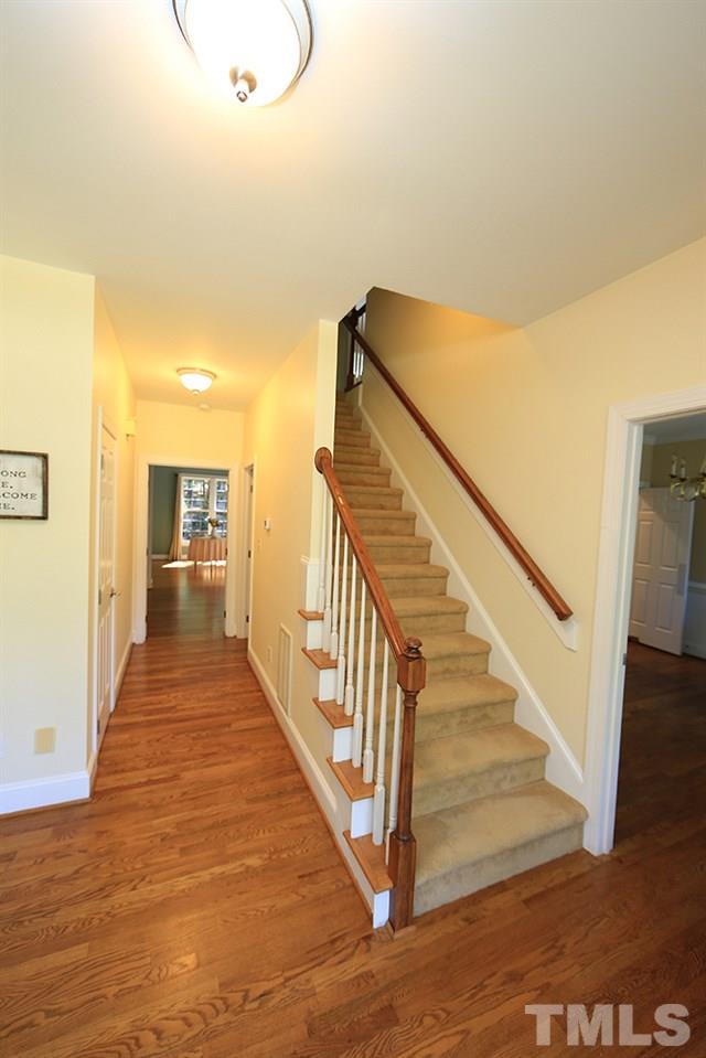5921 Wild Orchid Trail Raleigh, NC 27613 - Photo 6 of 30 Welcoming foyer to greet your guests. Front and back stairwells.