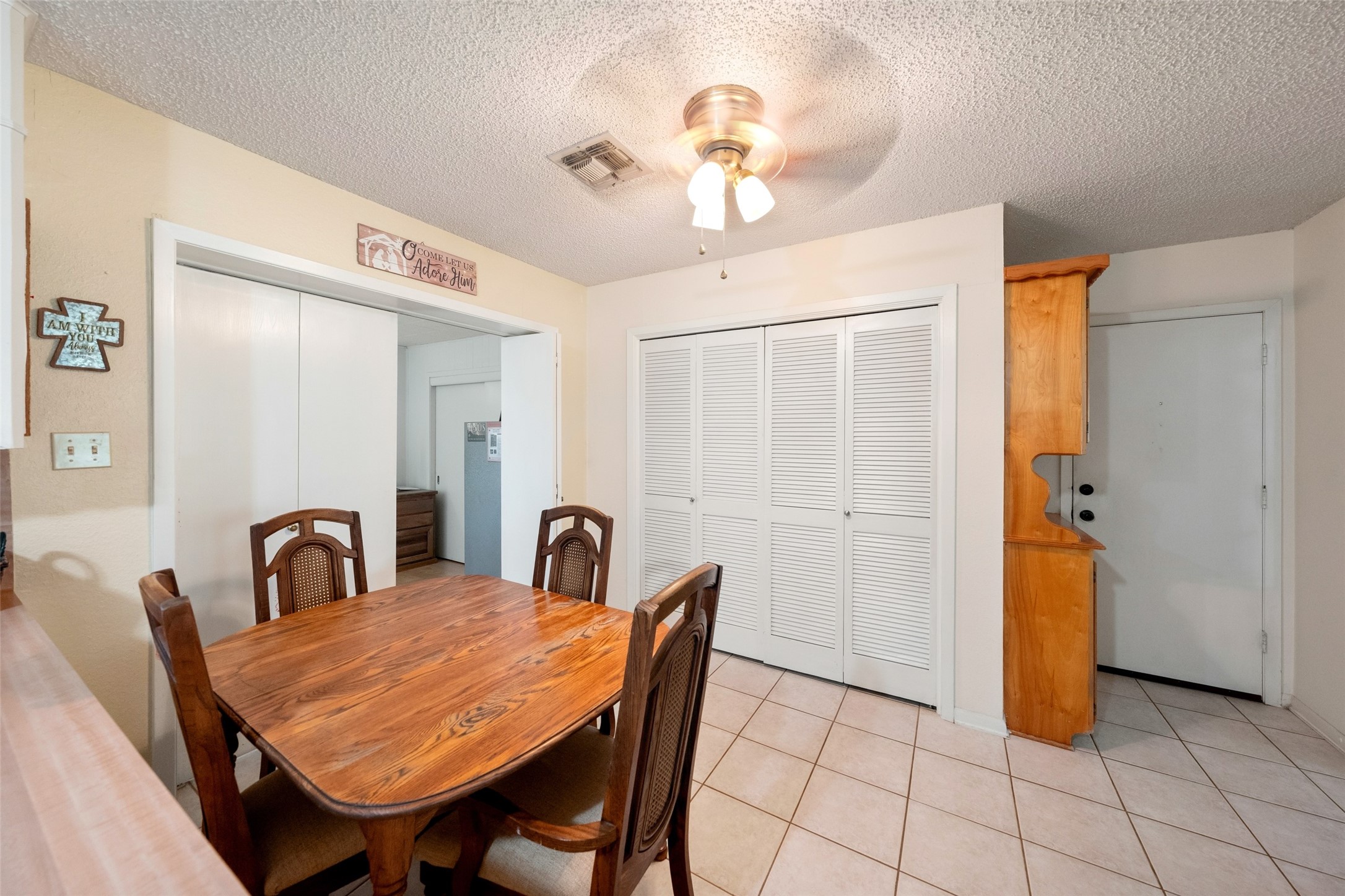 25739 Old Howth Road Hempstead, TX 77445 - Photo 10 of 36 The casual dining area sits right beside the kitchen, creating a practical everyday setup with easy access to the adjoining flex and family rooms, plus a utility closet and additional storage.