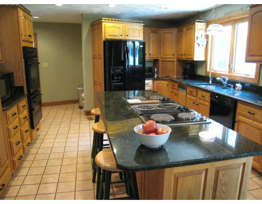 20 Arrowhead Farm Road Boxford, MA 01921 - Photo 4 of 18 a kitchen with a sink and a stove top oven