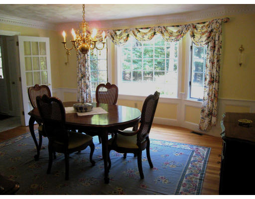 20 Arrowhead Farm Road Boxford, MA 01921 - Photo 6 of 18 a view of a dining room with furniture and chandelier