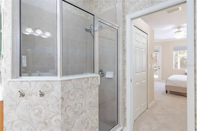 a view of a house with wooden deck