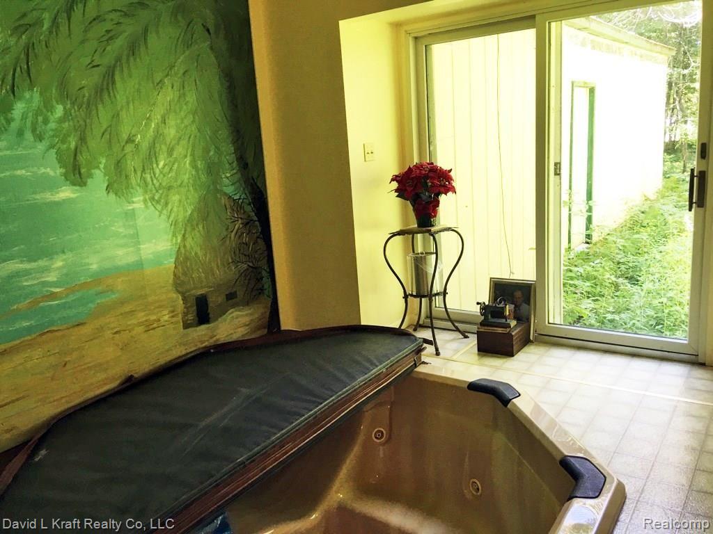 5881 Port Austin Road Caseville, MI 48725 - Photo 14 of 18 5881PtAustinHotTub.jpg