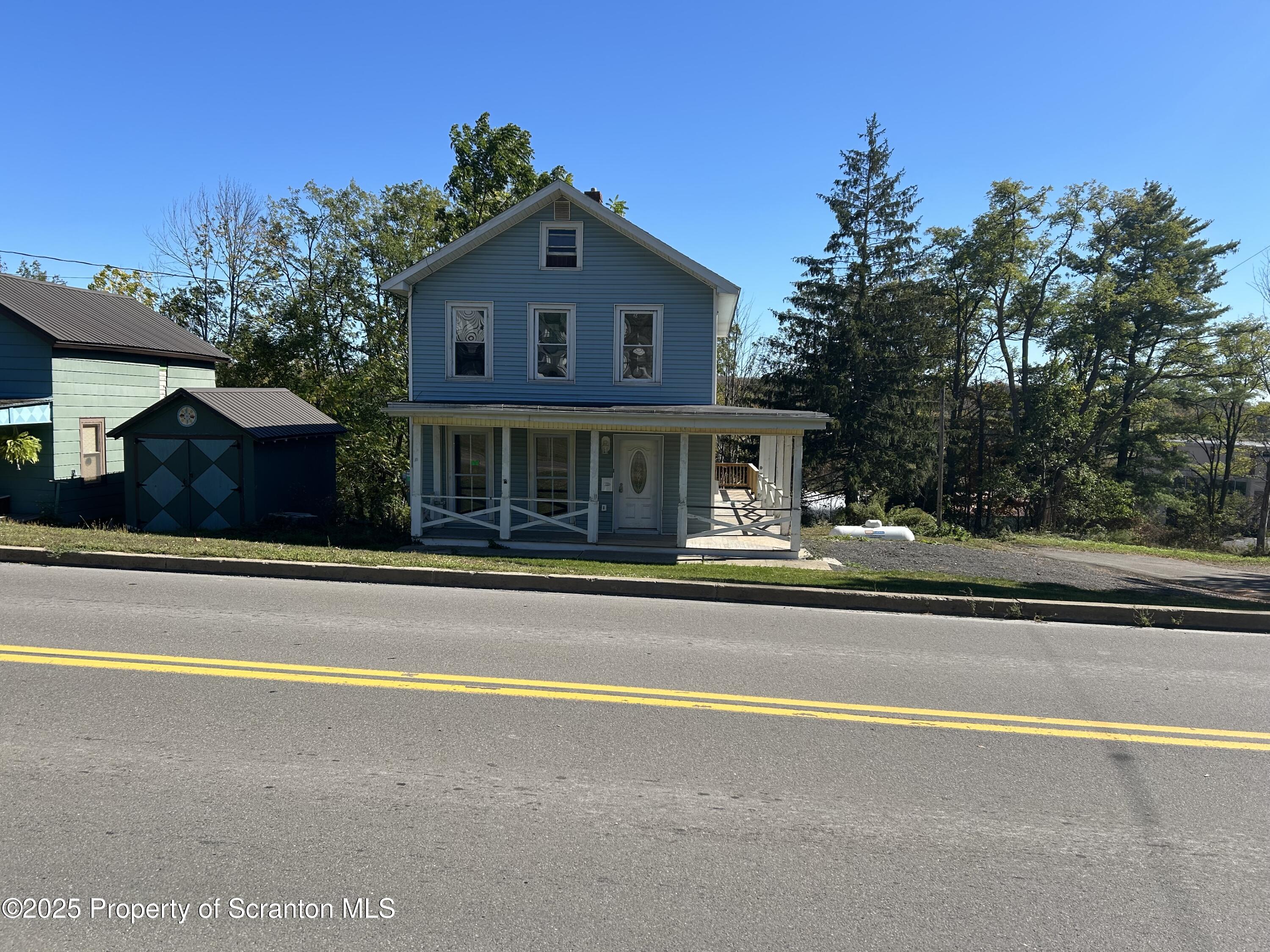 a view of a house with a swimming pool