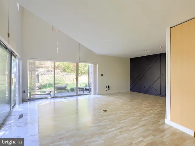 a bathroom with a sink a mirror and a toilet