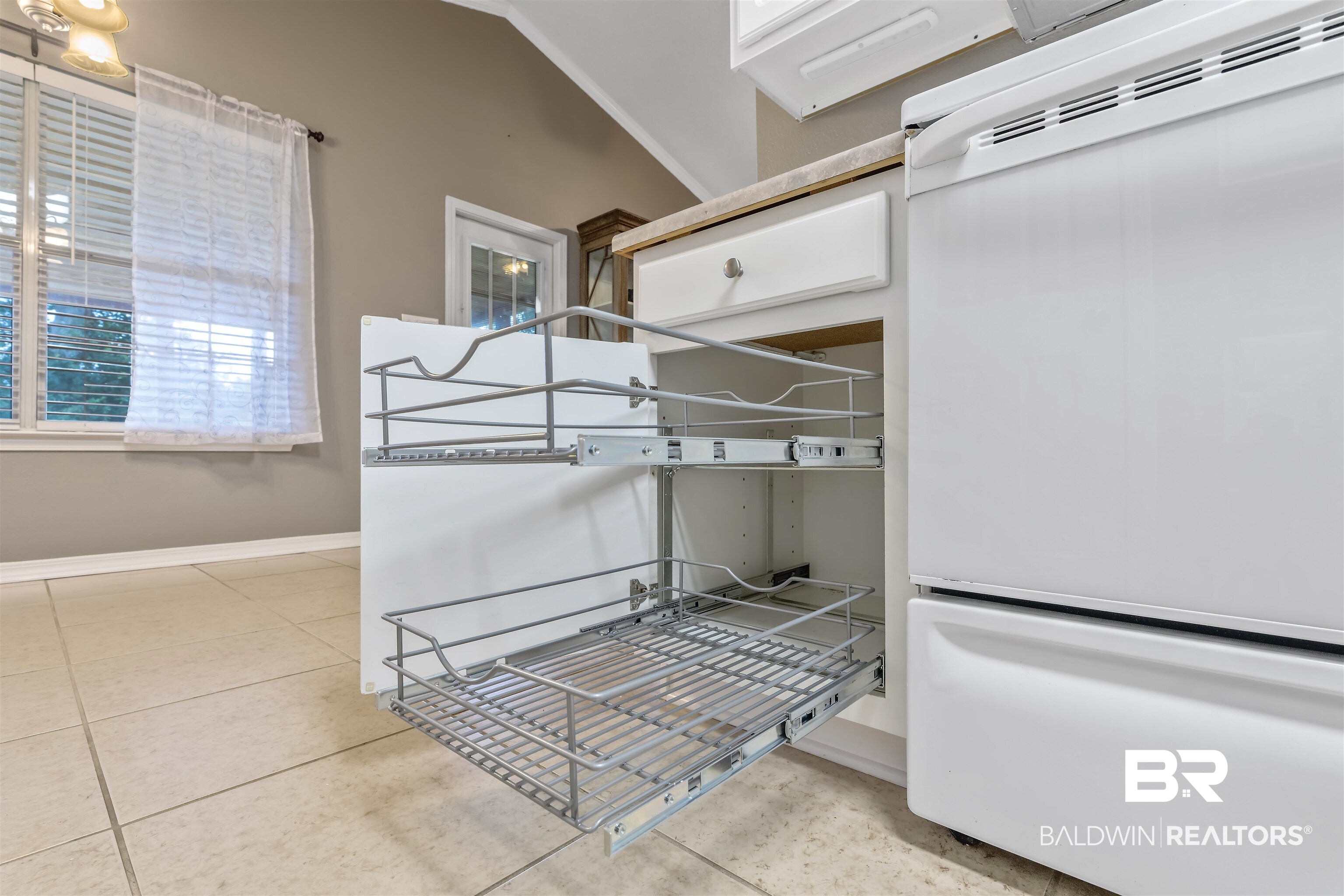 11097 Pontchartrain Loop Daphne, AL 36526 - Photo 13 of 28 Bedroom with refrigerator and tile patterned floors